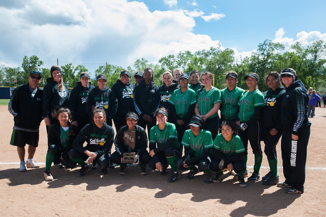 The Rancho softball team pose with their second place trophy after losing to Spanish Springs ...