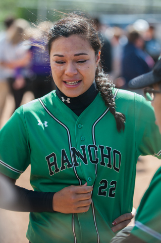 Racho’s Tiare Lee (22) cries while talking with her teammates after losing to Spanish ...