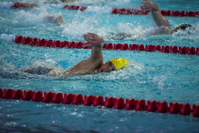 Nick Lara of Boulder City High School swims during the Nevada High School State Championship ...