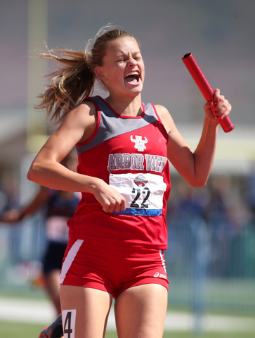 Arbor View’s Madison Aldred celebrates at the finish line of the DI 4×200 relay ...