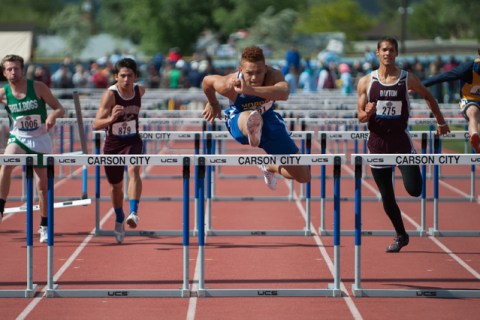 Moapa Valley’s RJ Hubert competes in 110 meter hurdles during the NIAA Division 1-A st ...