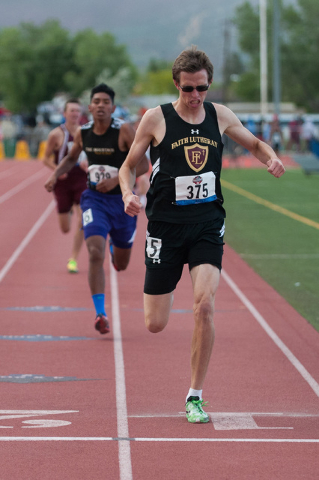 Faith Lutheran’s Chase Wood competes in the boys 1600 meter run during the NIAA Divisi ...