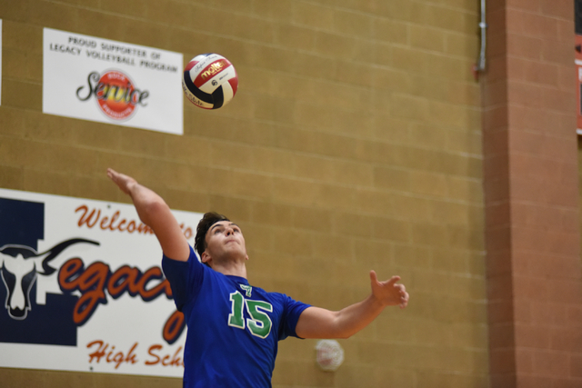 Green Valley’s Dustin Elliot (15) serves the ball against Foothill during their Divisi ...