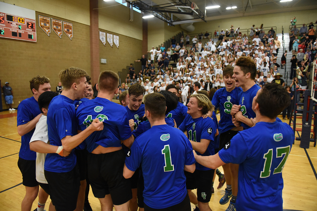 Green Valley teammates celebrate their win against Foothill during their Division I state vo ...