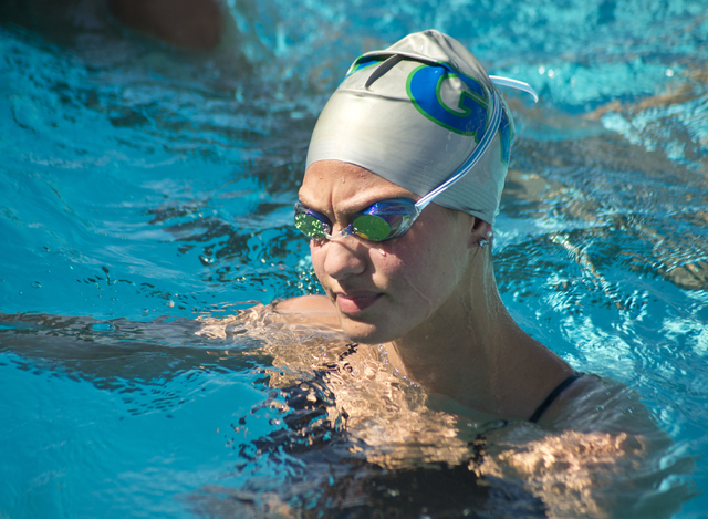 Abby Richter takes a break during practice at the Henderson Multigenerational Center pool in ...