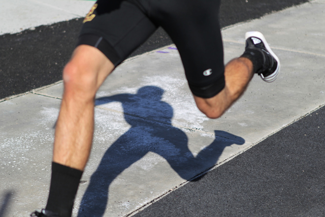 Faith Lutheran runner Mark Rubalcaba, 18, works on his long jumps during a track practice at ...