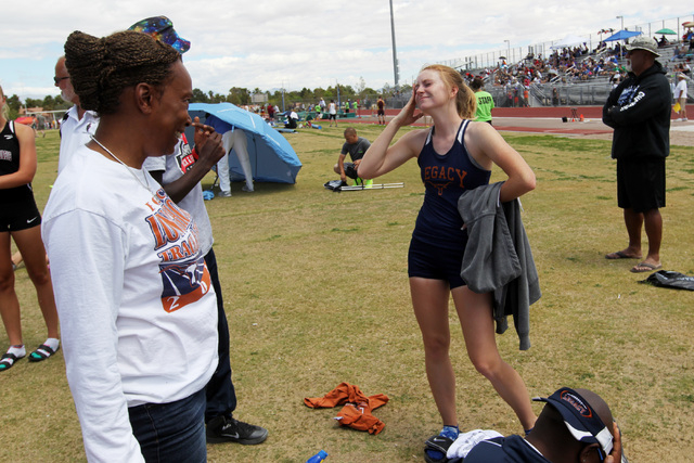Legacy high jumper Victoria Wuest reacts in disbelief after unexpectedly winning the high ju ...