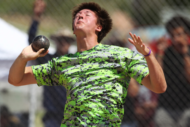 State champion Brady Williams of Green Valley throws the shot put during the Nevada NIAA sta ...
