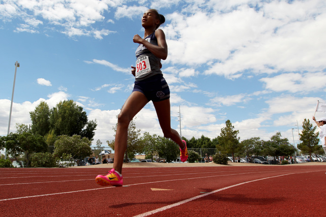 Centennial freshman Alexis Gourrier runs away from the pack in the 1600 meter run during the ...