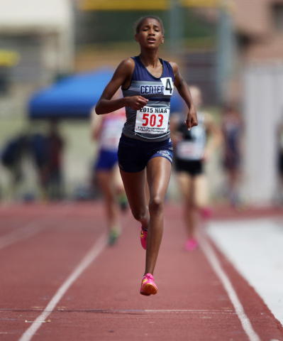 Centennial freshman Alexis Gourrier finishes ahead of the pack in the 1600 meter run during ...