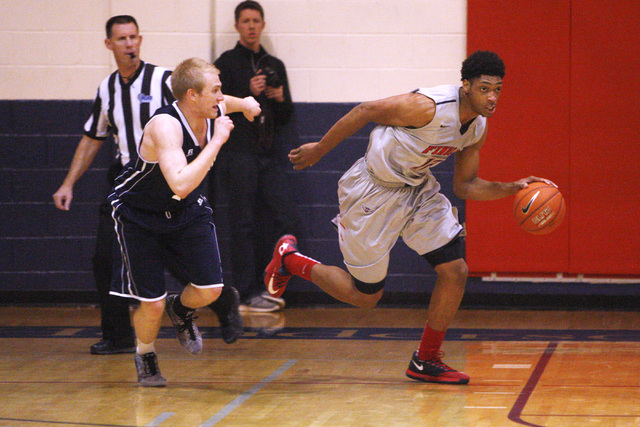 Findlay Prep forward Justin Jackson takes the ball up court against Westwind during their ga ...