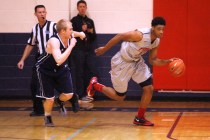 Findlay Prep forward Justin Jackson takes the ball up court against Westwind during their ga ...