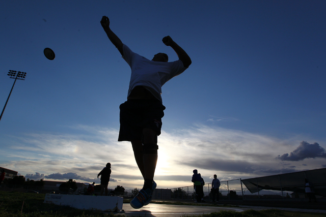 Liberty senior Reno Tu’ufuli, shown practicing Tuesday, has the third-best discus throw in ...