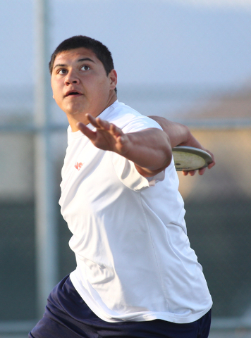 Liberty senior Reno Tu’ufuli, shown practicing Tuesday, has the third-best discus throw in ...