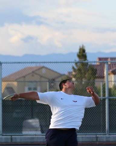 Liberty senior Reno Tu’ufuli, shown practicing Tuesday, has the third-best discus throw in ...