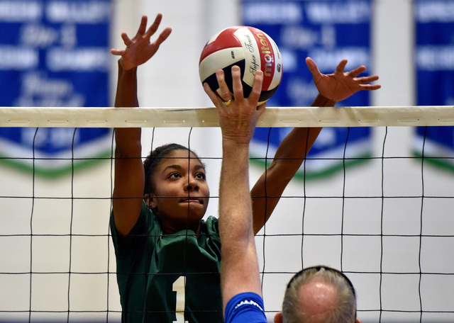 Senior Maya Hill goes up for the block during volleyball practice at Green Valley High Schoo ...