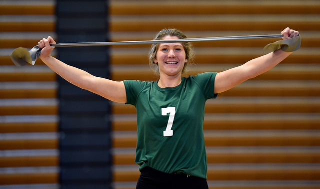Senior Jordan Burns stretches during volleyball practice at Green Valley High School Tuesday ...