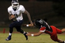 Centennial running back Rhamondre Stevenson eludes Las Vegas defender Jacob Littlefield on S ...