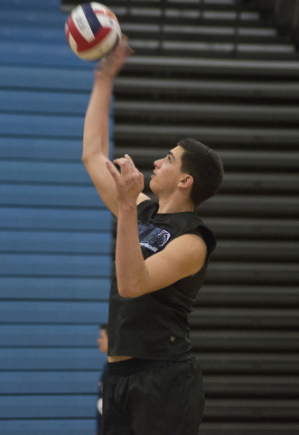 Tyler Jacob (15) serves the ball during volleyball practice at Foothill High School in Hende ...