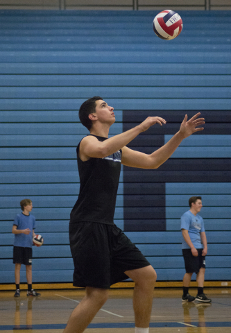 Tyler Jacob (15) serves the ball during volleyball practice at Foothill High School in Hende ...