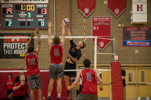 Brandon Kampshoff (11) of Las Vegas spikes the ball against Arbor View at Arbor View High Sc ...
