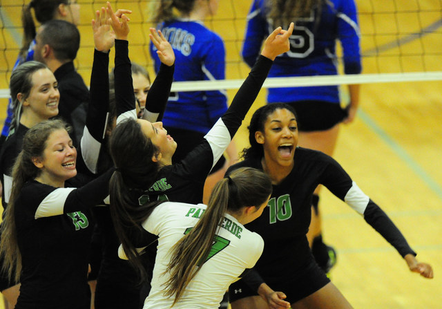 Palo Verde players celebrate their come-from-behind win against Sierra Vista during prep vol ...
