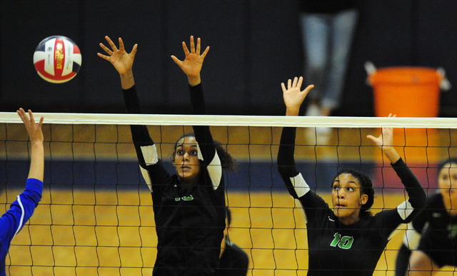 Palo Verde’s Nickelle Fleming, left, and Jacquelyn Fields block the ball against Sierr ...