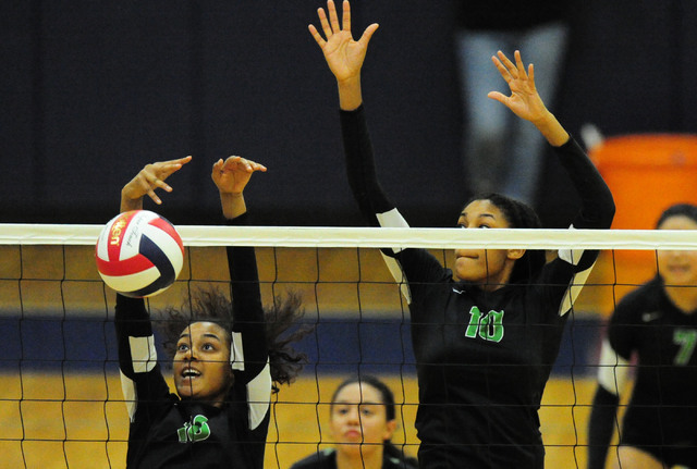 Palo Verde’s Nickelle Fleming, left, and Jacquelyn Fields block the ball against Sierr ...