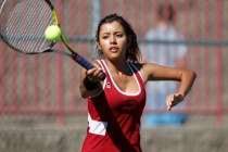 Western’s senior Nathalia Luna, 18, returns the ball during her match against Del Sol& ...