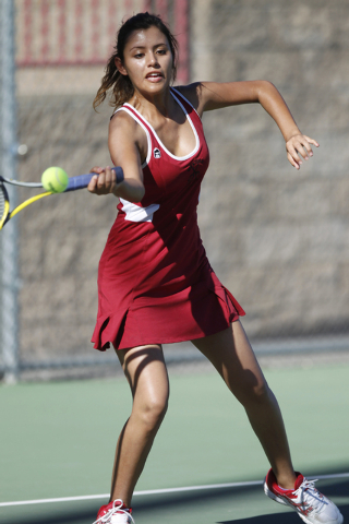 Western’s senior Nathalia Luna, 18, returns the ball during her match against Del Sol& ...