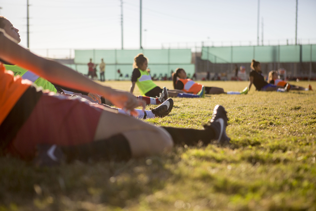 The Western Warriors girls soccer team stretch before practice at Western High School, Wedne ...