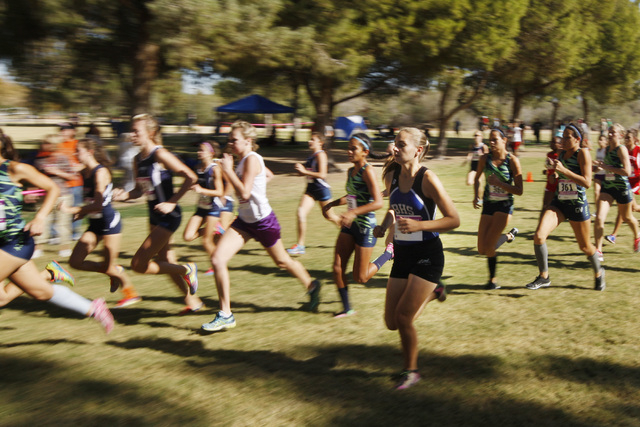 Competitors head through Sunset Park during the Sunrise Region cross country championships F ...