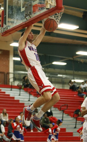 Valley’s Spencer Mathis dunks the ball during a game against Coronado on Wednesday.