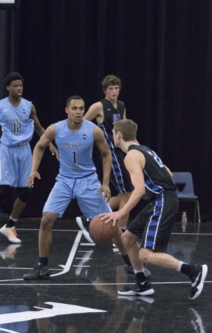 Team Howard Pulley shooting guard Gary Trent Jr., second left, (1) guards a team UBC player ...