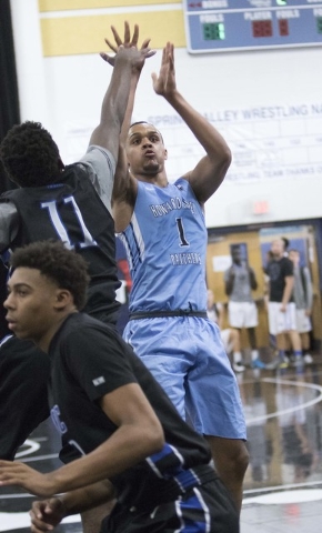 Team Howard Pulley shooting guard Gary Trent Jr., right, (1) shoots over a team UBC player d ...