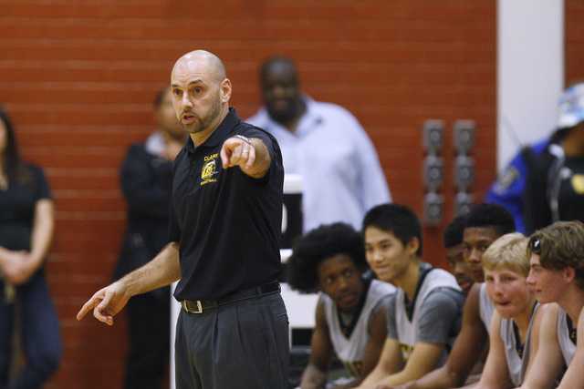 Clark head coach Chad Beeten directs his players against Mojave on Tuesday. Clark won 52-47 ...