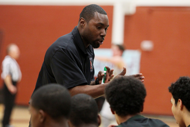 Colin Darfour talks to his players during a game in January 2015. Darfour, who previously co ...