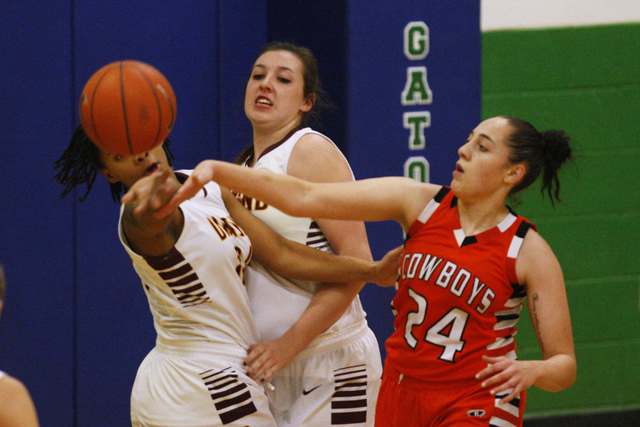 Chaparral guard Alexis Vanstory swats the ball away from Dimond guard Dejha Canty during the ...