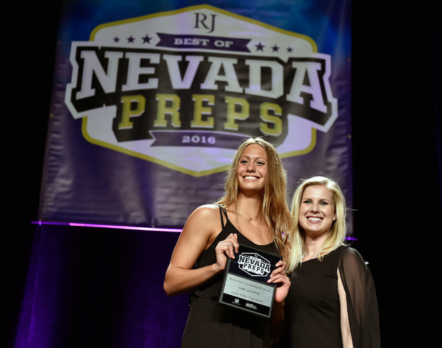 Green Valley’s Amy Richter, left, displays her swimming award during the Best of Nevad ...