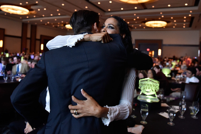 Biaggio Ali Walsh, left, receives a hug from his mother, Rasheda Ali Walsh after receiving h ...