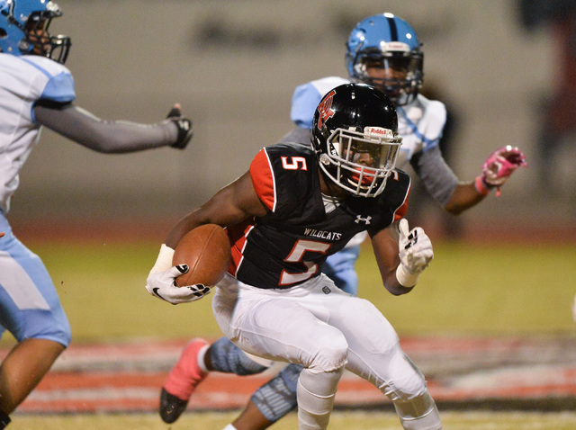 Las Vegas kick returner Eric Williams (5) returns a kickoff during the Las Vegas High School ...