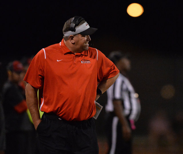 Las Vegas head coach James Thurman walks the sideline during the Las Vegas High School Canyo ...