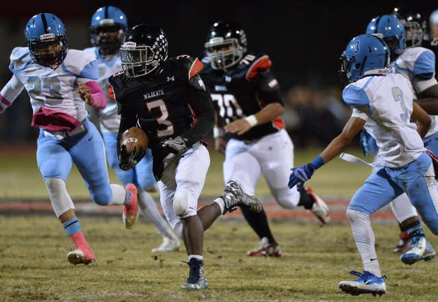 Las Vegas running back DiQuan Brown (3) runs the football during the Las Vegas High School C ...