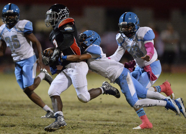 Las Vegas running back DiQuan Brown (3) runs the football during the Las Vegas High School C ...