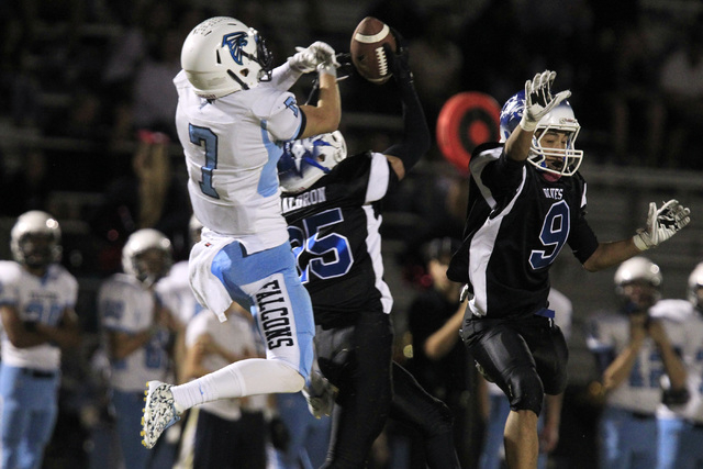 Basic safety Jake Waldren intercepts a pass intended for Foothill wide receiver Aedan Bartol ...
