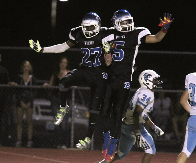 Basic wide receiver Josh Villaros, left, and wide receiver Tayj’ean Thomas celebrate V ...