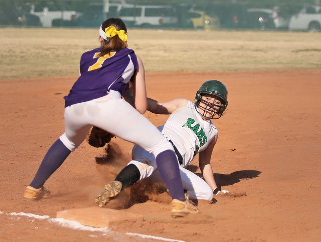 Rancho’s Tori Hafen, right, slides safely into third base with an RBI triple as Durang ...