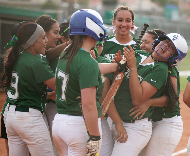 Green Valley’s Samantha Loving, far right, is swarmed by teammates after hitting a hom ...