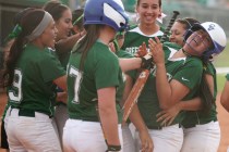 Green Valley’s Samantha Loving, far right, is swarmed by teammates after hitting a hom ...