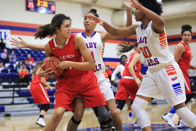 Castle View sophomore India Cole (31) is guarded by Bishop Gorman’s Skylar Jackson (20 ...